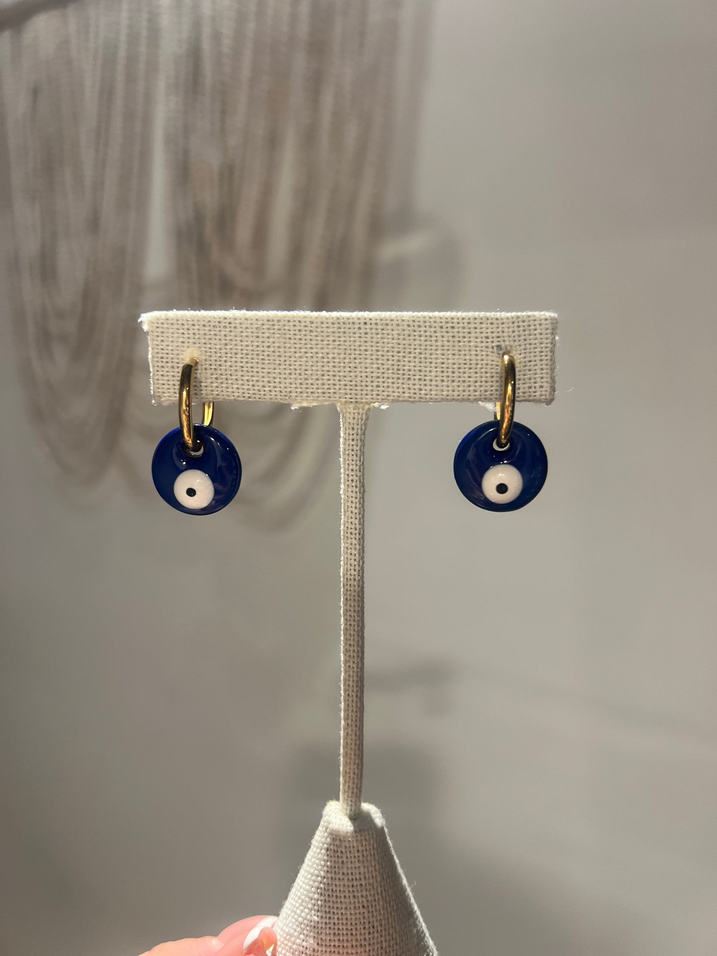 Evil eye round earrings